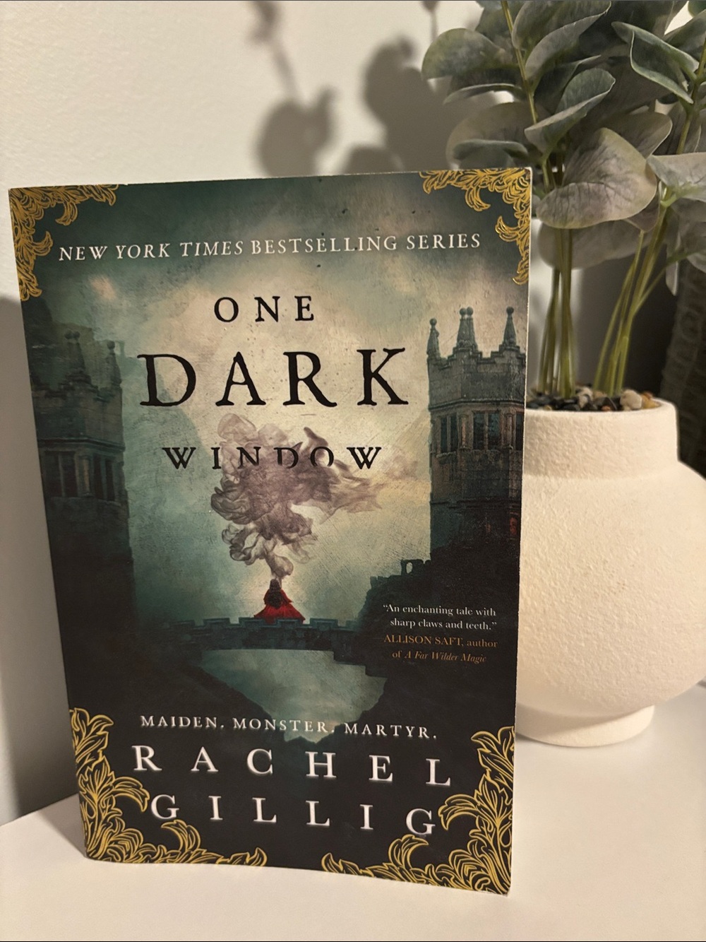 One Dark Window by Rachel Gillig - Paperback Book, Green and Gold Cover